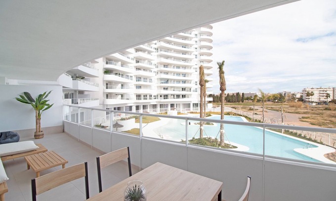 Canet de Berenguer Apartment | Global Properties: Apartment with terrace and pool views in Gran Canet