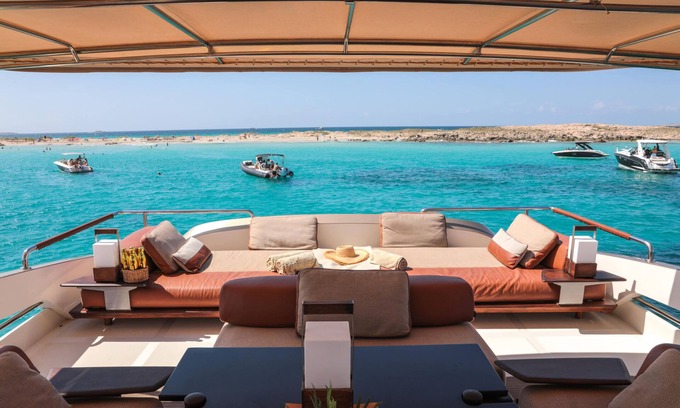 La Savina Boat Rental | Goldfinger - Floating Home', a luxury catamaran yacht on the island of Formentera