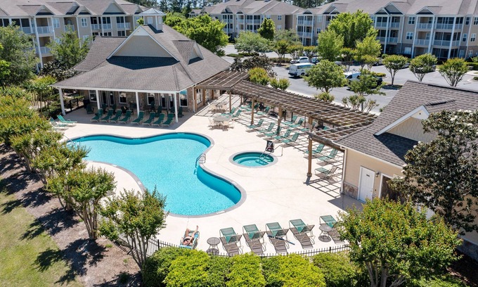 Calabash Condo | Golf community condo near beach with on-site pool, golf, & screened balcony