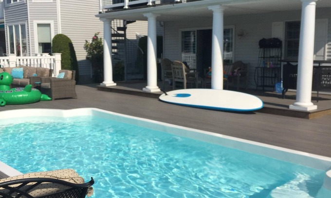Riviera House | Gorgeous Bay Front property with boat slip and pool