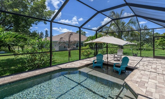 Jacarandas House | Gorgeous Cape Coral Home for a Family Getaway, w/amazing Pool & Waterfall Spa!