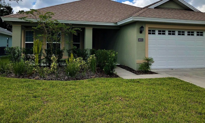 Tavares House | Gorgeous fully furnished home in gated golf community!