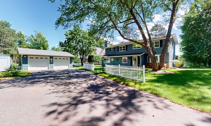 Minocqua House | Gorgeous lakefront home with dock, sandy beach area, fireplace, huge deck & WIFI