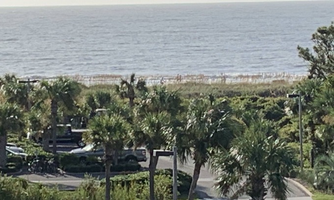Folly Field Condo | Gorgeous ocean view villa with spacious balcony and private beach access.