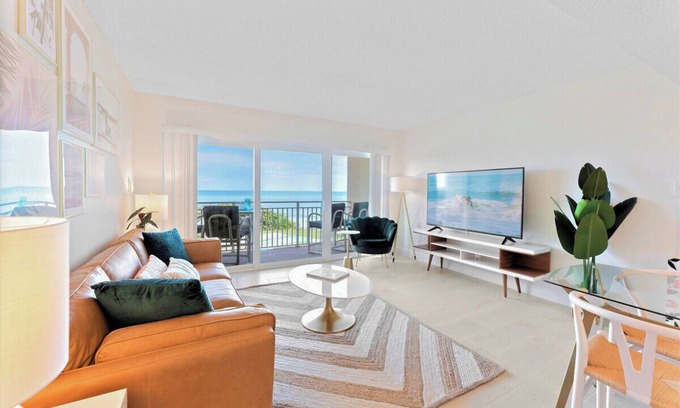 Satellite Beach Condo | Gorgeous Oceanside Oasis w/Heated Pool, Oceanfront Patio & Steps to the Beach 🏖️☀️