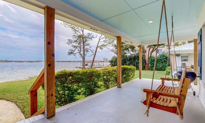 Fort Walton Beach House | Gorgeous waterfront coastal cottage with dock, Wifi, & private washer/dryer