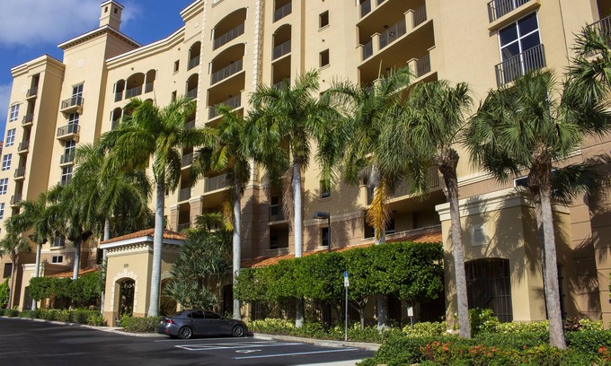 Burnt Store Marina Condo | GRAND ISLES III, 5th Floor Condo w/an AMAZING SUNSET VIEW in a Tropical Setting