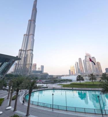 Downtown Dubai Apartment | Grandeur 2 Bedroom Apartments I Burj Khalifa & Fountain Views I Free Parking, Gym, Pool, Wi-Fi & PS5 I by Skyline Serenity