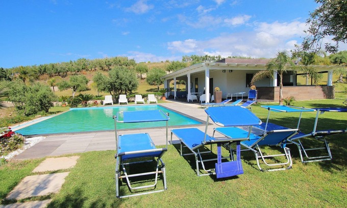 Campofelice di Roccella Villa | Green Suite - Modern Villa with Private Infinity Pool, Stunning Sea View, Wi-Fi