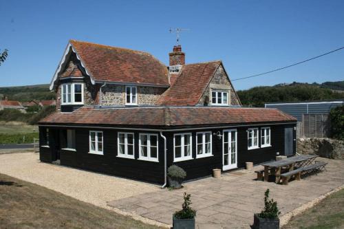 Newport House | Greystone Cottage - Sea views, short stroll to a beautiful sandy beach