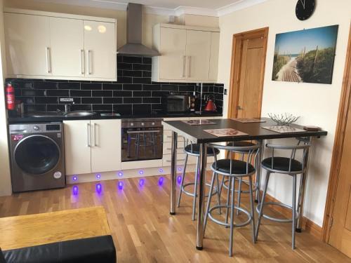 Brean Apartment | Ground floor 2 bed apartment in central location with private access to 7 miles of sandy beach (sleeps 4)