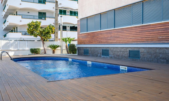 Torredembarra Apartment | Ground Floor Apartment with WiFi, AC, Terrace, Pool, and Parking near Beach