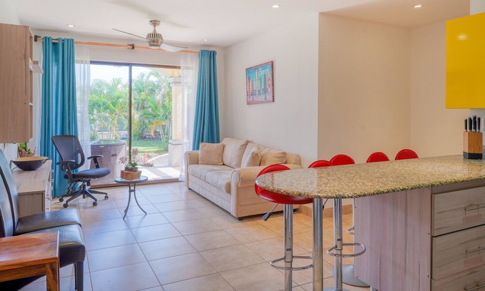 Villarreal Condo | Ground-floor condo with pool & garden views, terrace, hot tub, AC, & W/D