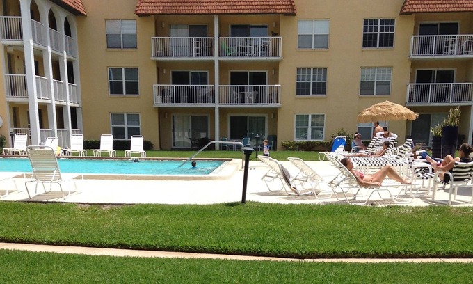 Point East Condo | Ground floor sea views - poolside on non-driving beach