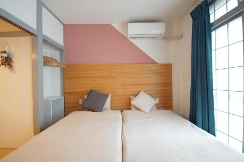 Kanazawa Apartment | Guest Room Tiie