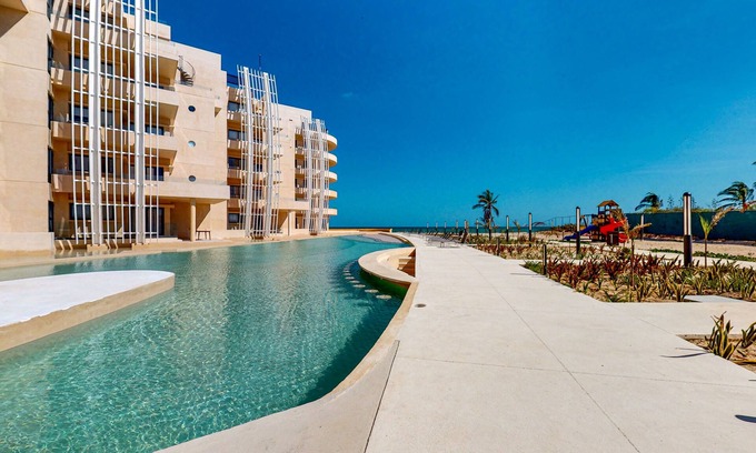 Telchac Puerto Apartment | Gulf-view getaway with a furnished terrace, pool, & easy beach access