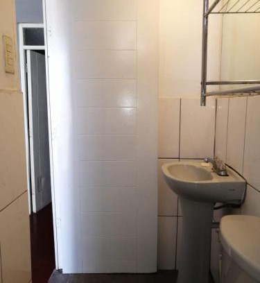 Cerro Colorado District House | Habitación Privada con baño privado
