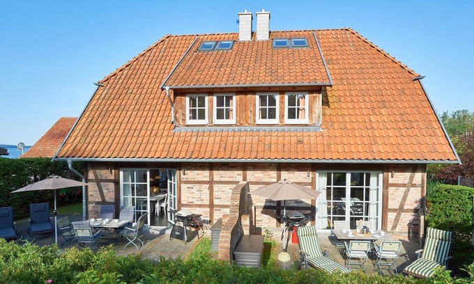Seedorf Apartment | Half-timbered houses Seedorf | House part 1 with fireplace+terrace - FS02