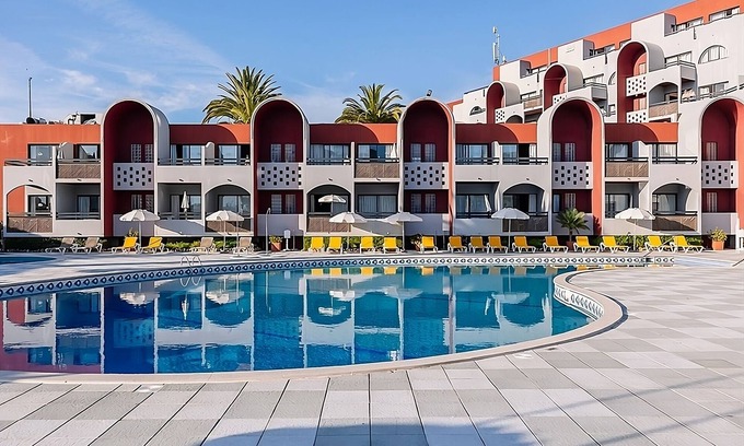 Areias de Sao Joao Hotel | Hassle-Free and Suiting Stay! Fully-furnished 1BR with Balcony and Kitchen!