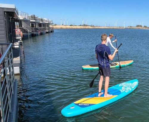 Wangerland Boat Rental | Hausboot-See-Rad-SUPs-Meer-Familie-Urlaub!