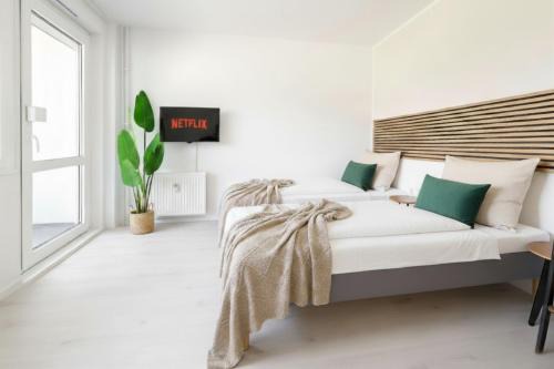 Stadtbezirk West Apartment | Havn Suites - Modernes 2-Raum Apartment für 4 Personen mit Balkon
