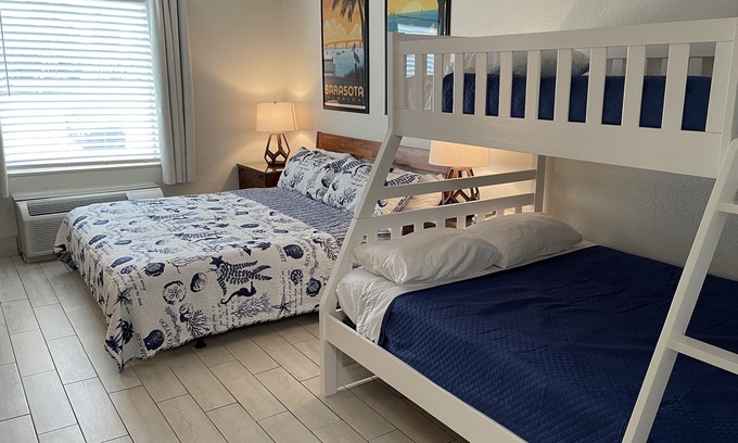 Trailer Estates Hotel | Heated Pool, King Bed, Bunk Bed, Huge TV, Marina, Tiki Bar & Grill