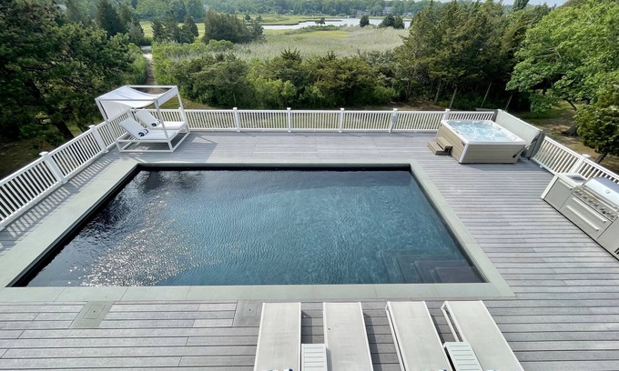 Southold House | HEATED POOL waterfront HOT TUB, GYM, Watersports, BOATER DELIGHT luxury modern