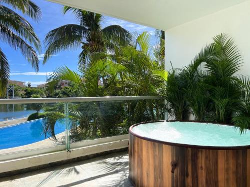 Puerto Aventuras Apartment | High-End Waterfront Condo at Secrets Waters