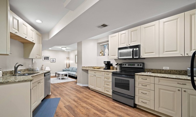 Sheffield and DePaul Condo | Historic Designer Lincoln Park Retreat Sleeps 14 by AllSet Turnover
