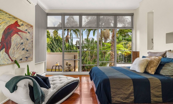 Redfern House | Historic sandstone home with designer interior & tropical garden. pets welcome!