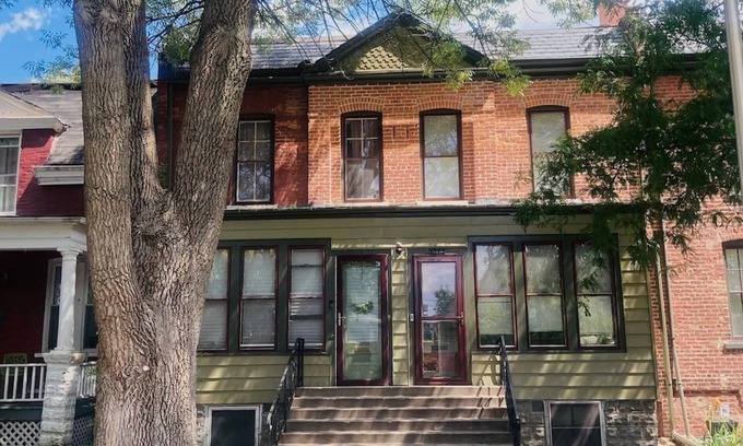 Pullman House | Historic Worker's Cottage with Vintage Charm Monthly Rental