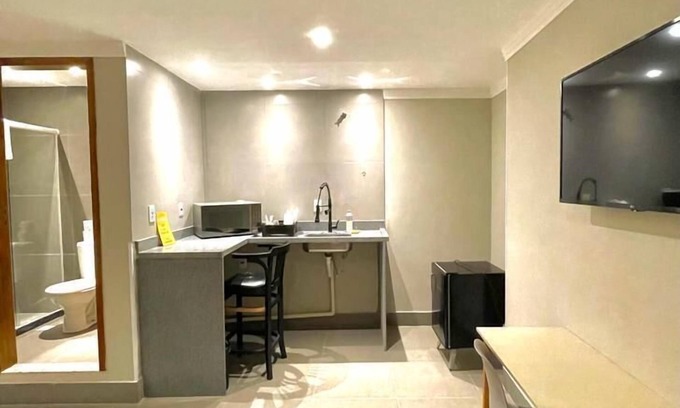 Zona Sul Hotel | HMG Suites Inn Budget Rio