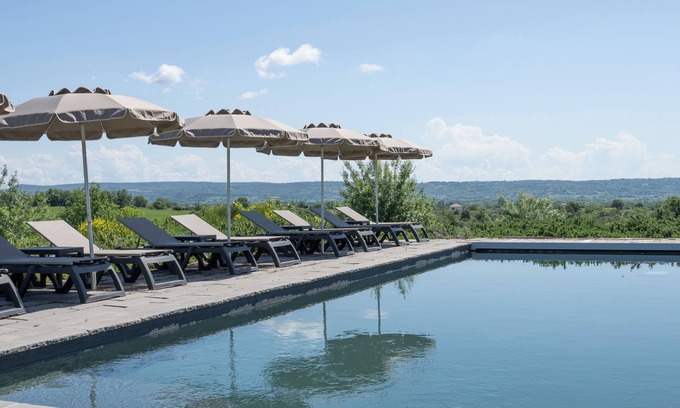 Saint-Sauveur-de-Cruzieres House | Holiday Home 'Gîte Figuier Au Mas Dujau' with Mountain View, Shared Pool and Wi-Fi
