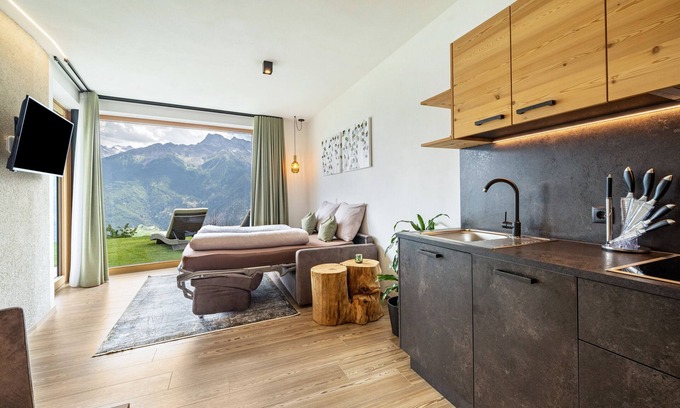 Lasa Apartment | Holiday Apartment 'Paflur Lodges Lärchenduft' with Mountain View, Garden & Wi-Fi