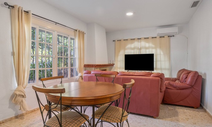 Chiclana de la Frontera House | Holiday Home 'Lolita B' with Shared Pool, Shared Garden and Wi-Fi