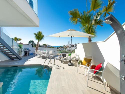 Chimenea House | Holiday Home Royal Palm by Interhome