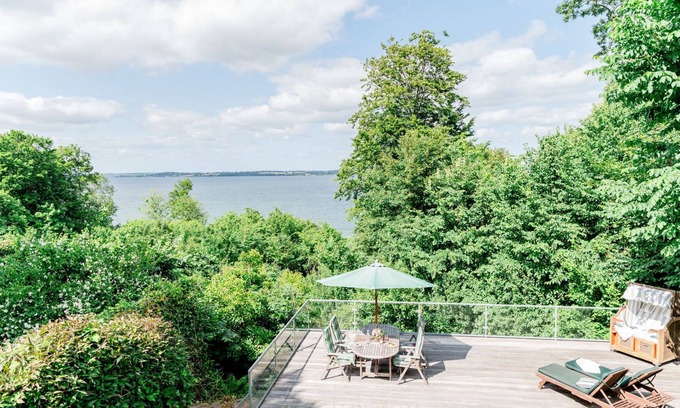 Langballig House | Holiday Home 'Seeblick' with Sea View, Private Terrace and Wi-Fi