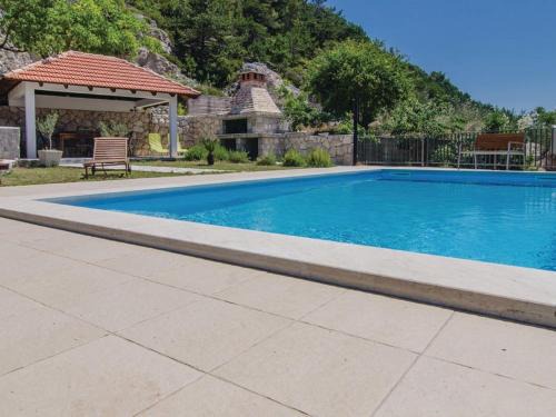 Donja Banda House | Holiday Home Stari Zoganj - Two Bedroom Holiday Home with Terrace and Swimming Pool
