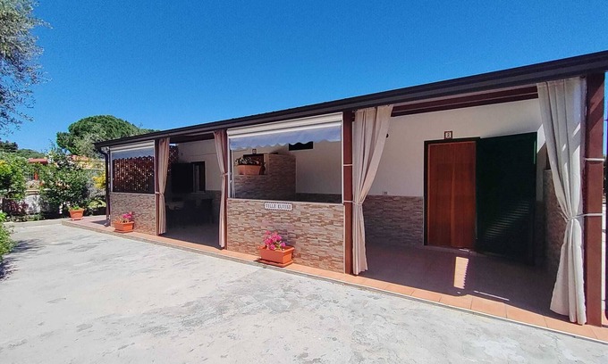 Defensola Apartment | Holiday Home 'Villa Elvira Monolocale' with Private Terrace, Shared Garden and Air Conditioning