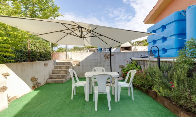 Arbus House | Holiday Home "Villetta Albachiara 49 B" with Sea View, Garden & A/C