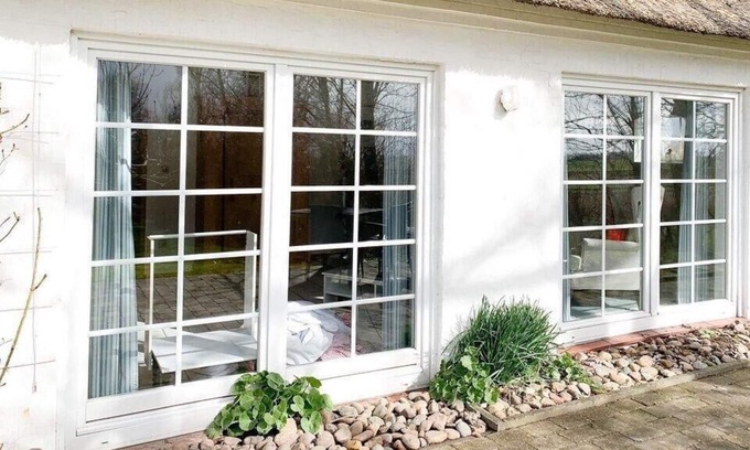 Osterhever House | Holiday home Weiße Reetdachkate