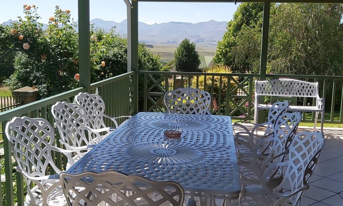 Clarens House | Holiday house priced per bedroom - 4, fenced garden, great views, walk to town