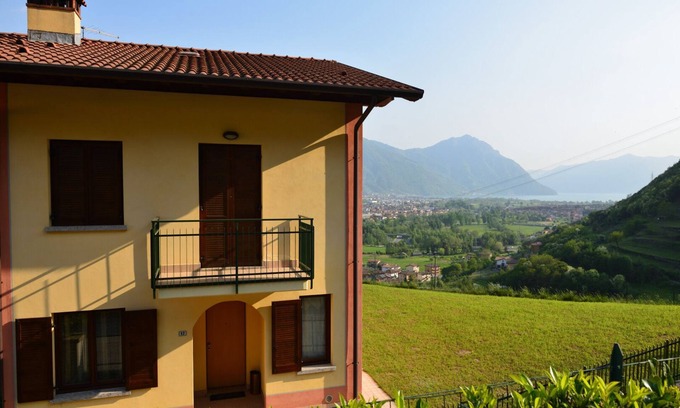Rogno House | Holiday house terraced villa with large garden