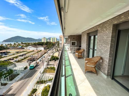 Vila Clais House | Home 48 I Apto pé na areia e com Piscina Aquecida em Bertioga