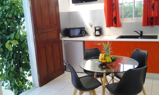 Damencourt House | Homerez - Nice house for 2 ppl. with shared pool, garden and terrace at Le Moule