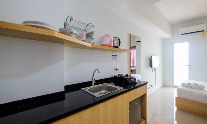 Karawang Apartment | Homey and Comfy Studio Tamansari Mahogany Apartment