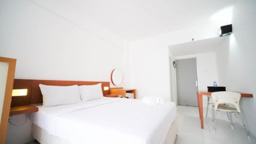 Surabaya Apartment | Homey Studio Apartment at Dian Regency By Travelio
