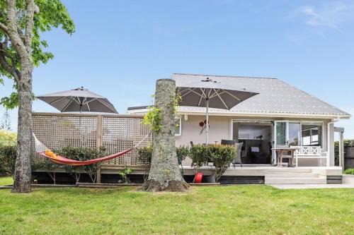 Pauanui House | Hosts on the Coast Sun Soaked Family Fun