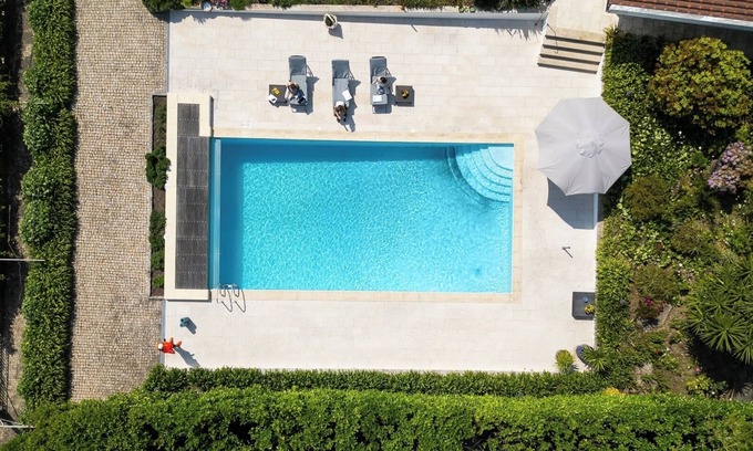 Paredes House | HostWise - Classic Villa w/Gym and Pool Access