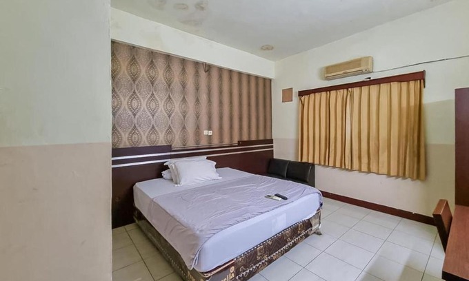 Palangkaraya Hotel | Hotel Halmahera Palangkaraya Mitra RedDoorz